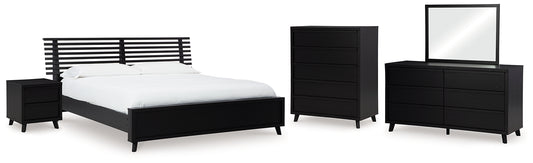 Danziar King Panel Bed with Mirrored Dresser, Chest and Nightstand